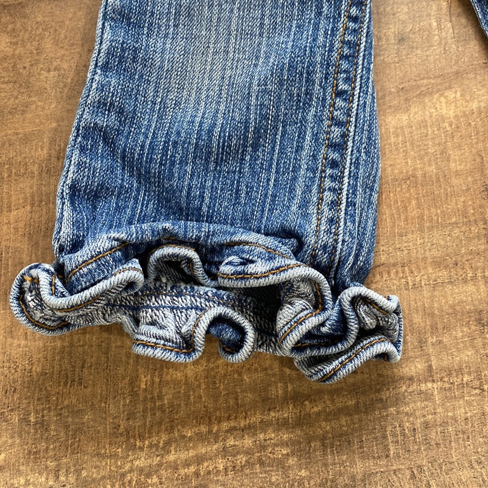BABY GIRL RUFFLE FLARE JEANS - Picture 2 of 4